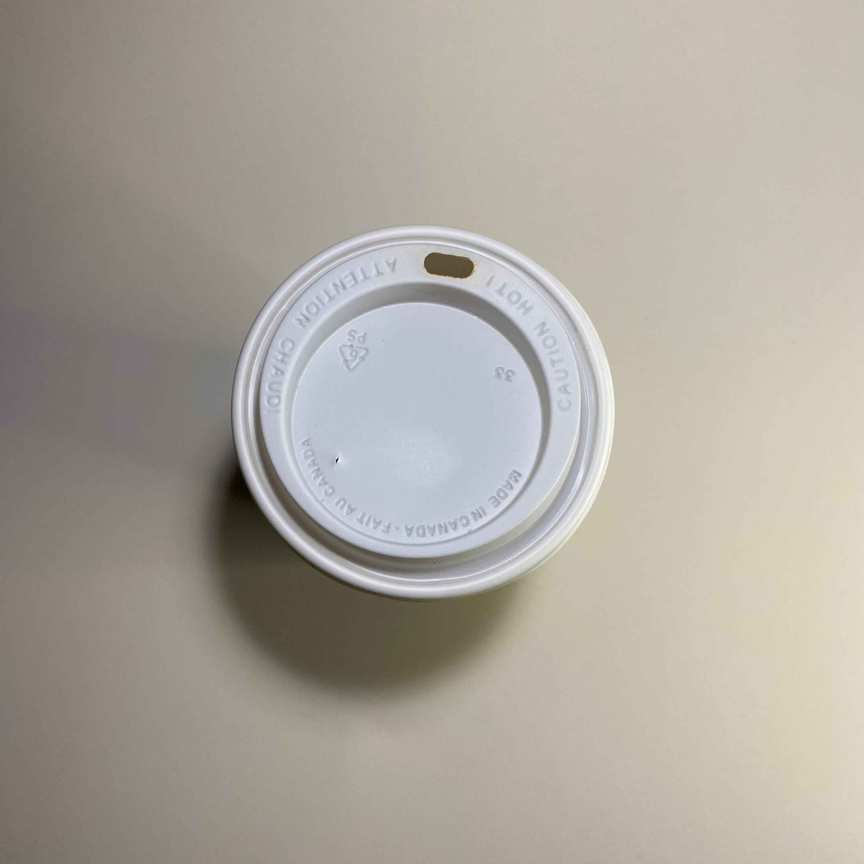 Top view of the cup, specifically the lid area